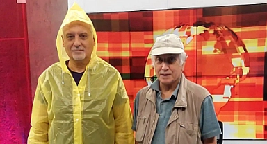 Programa yağmurluk ve çizme ile katıldı