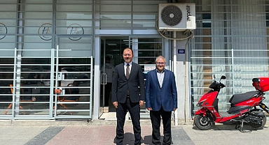 Erdinç Dolu, tapu müdürü Kazım Dülger'i ziyaret etti