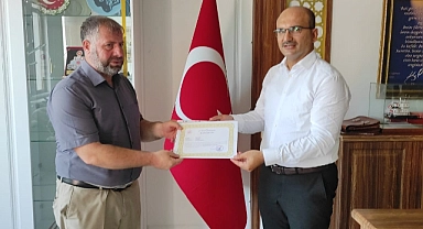 Abacı, diyanet personelini başarı belgesi ile onurlandırdı