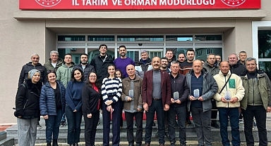 Emekli personellere plaket töreni