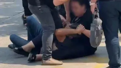 Bir erkek eski eşi tarafından cadde ortasında dövüldü
