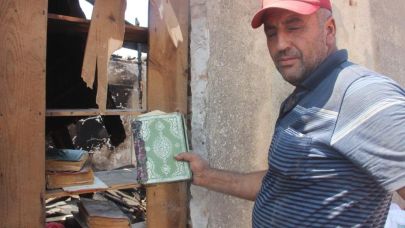 Yanan evde Kur'an-ı Kerim'ler sapasağlam kaldı