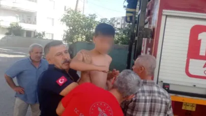 Yangında mahsur kalan yaşlı kadın ile çocuk kurtarıldı